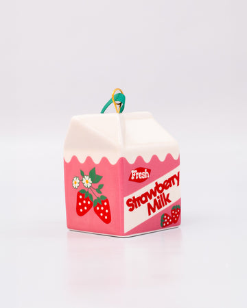 side view of ceramic strawberry milk carton ornament