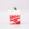 side view of ceramic strawberry milk carton ornament