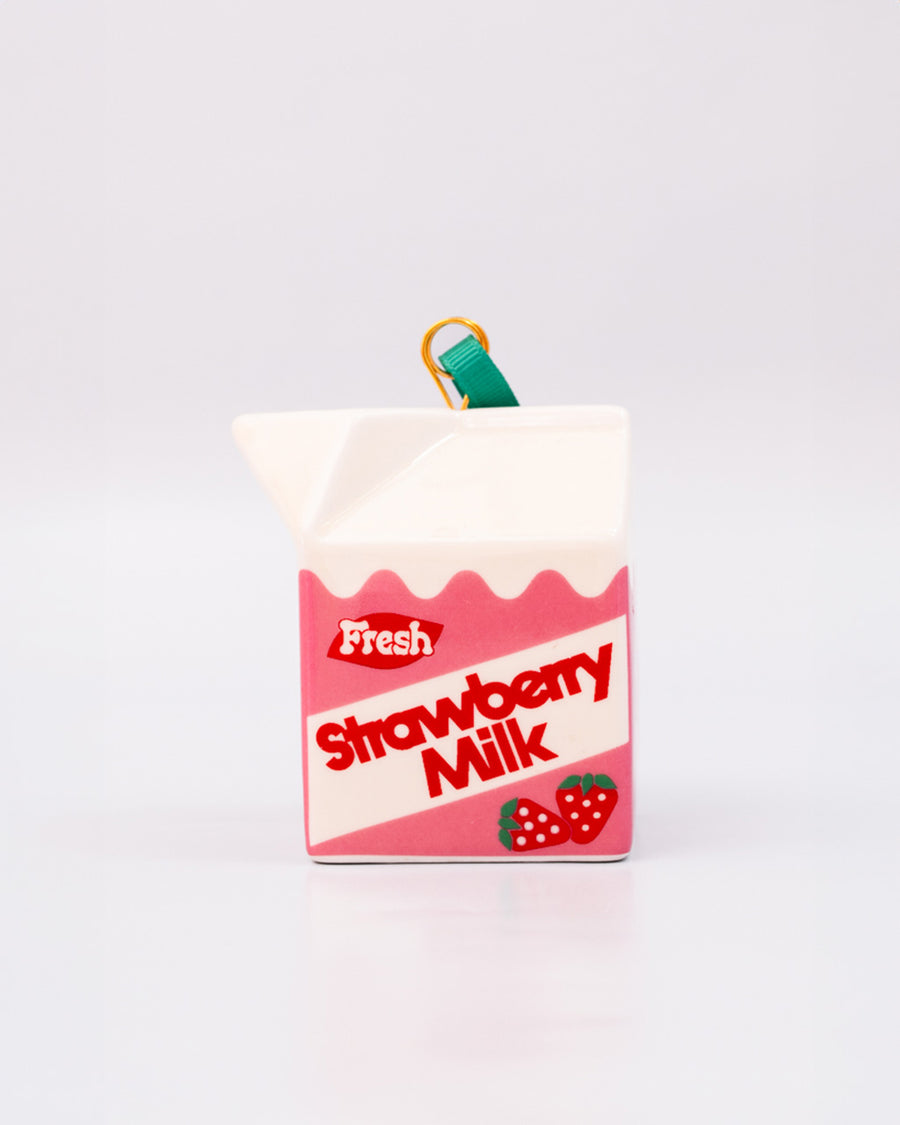 side view of ceramic strawberry milk carton ornament