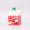 side view of ceramic strawberry milk carton ornament