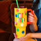 hands holding yellow Life of the Party Tumbler