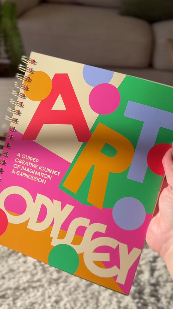 model flipping through art odyssey journal