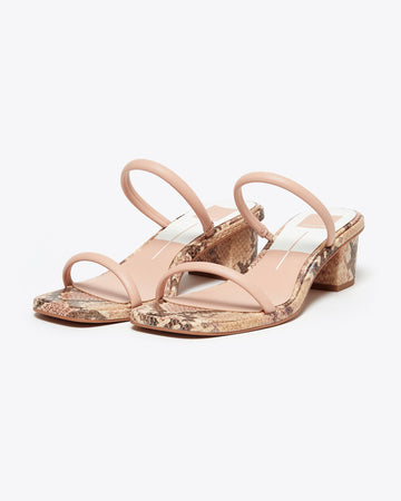 slide-on sandal with 2-inch heel. blush, brown, tan snake skin footbed with two blush skinny straps to fit over toes and top of foot.