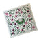 square bandana with floral print and tombstone graphic in the middle that says 'she worked really hard'