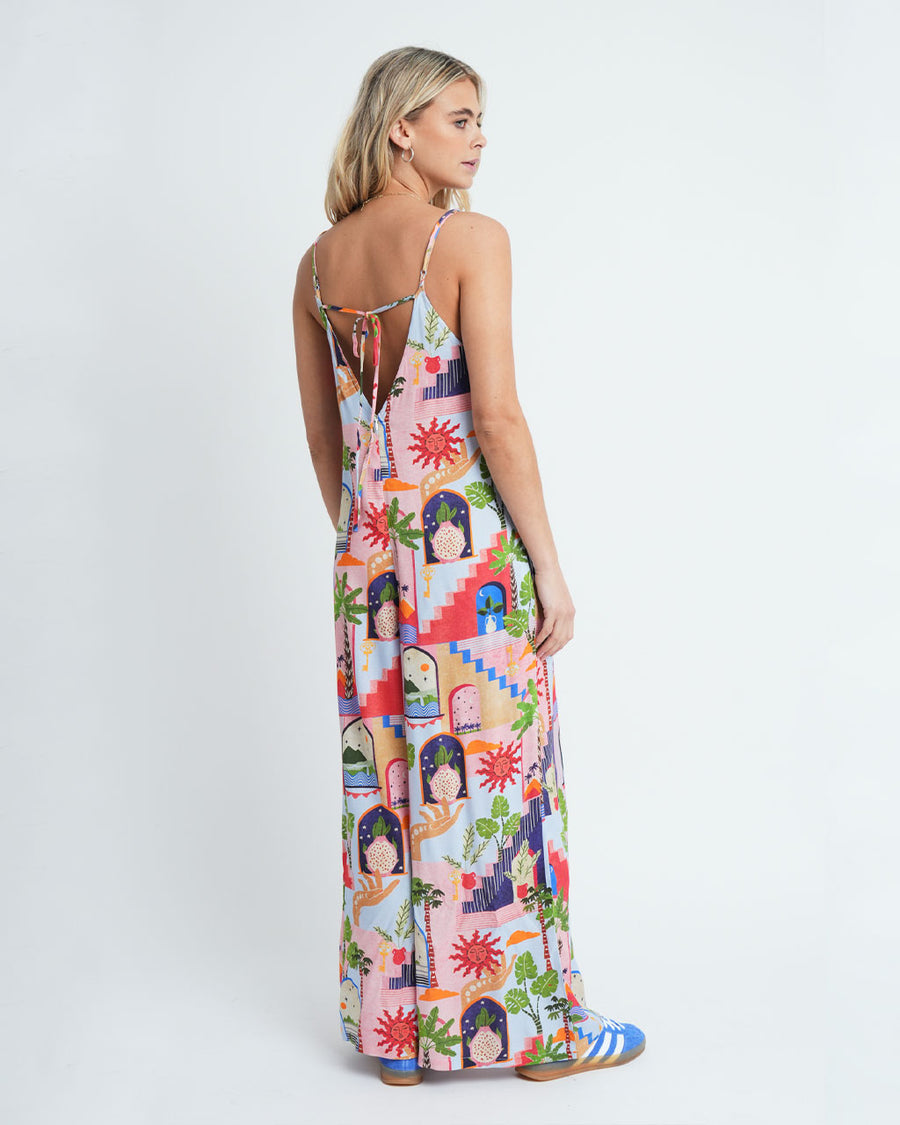 back view of tie back of colorful abstract print jumpsuit