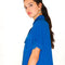 side view of model wearing royal pocket front button down top