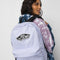 model wearing lavender backpack with 'vans off the wall' patch on the front