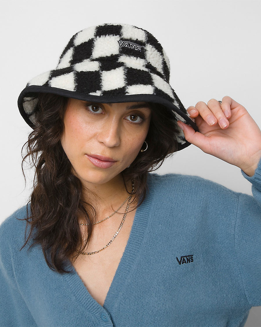 model wearing black and white checker sherpa bucket hat