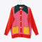 colorblock coat/cardigan in pink and red with green large collar and yellow pockets