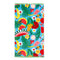 large beach towel with blue ground, abstract fruit print and green pom poms on each end