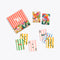 colorful playing card deck with multicolor floral design on back and assorted stripe pattern on front with coordinating striped packaging