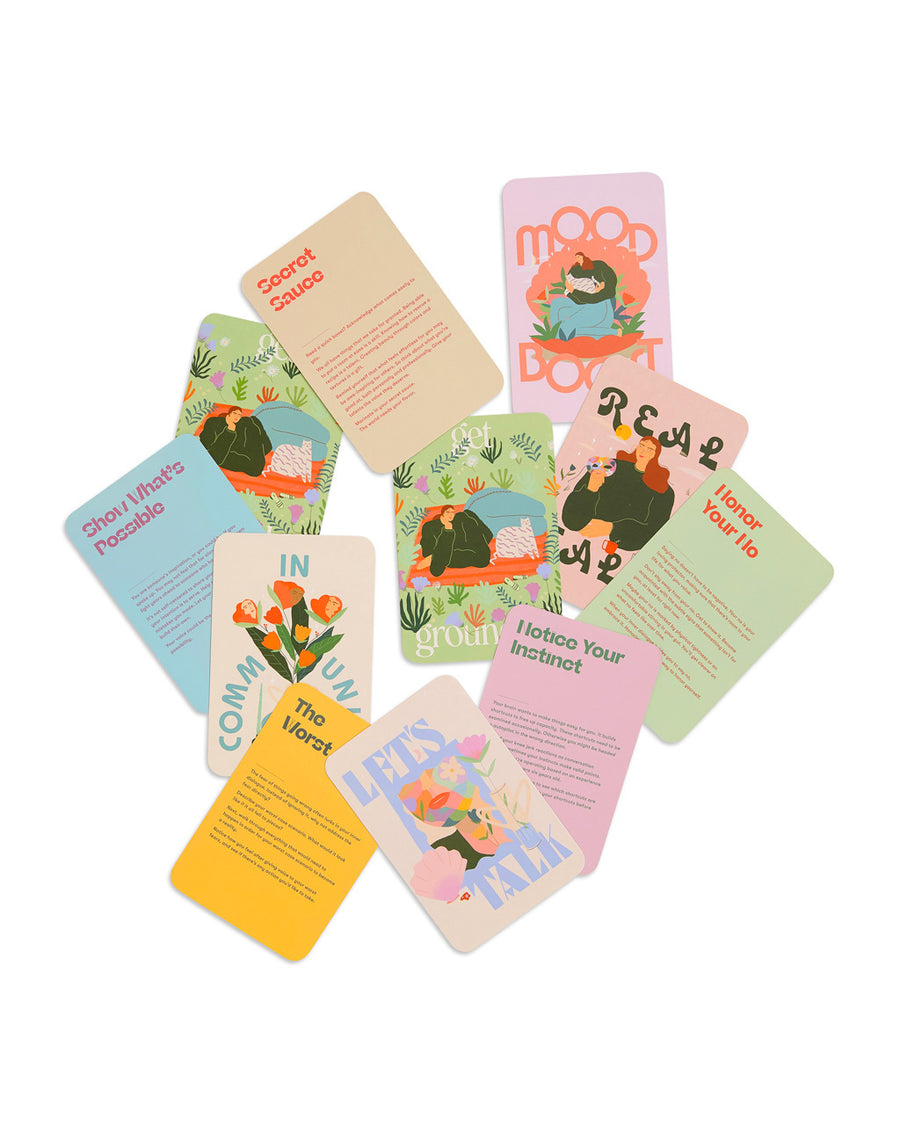 a variety of scattered cards displaying various designs related to self care