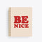 spiral bound notebook cover in ivory with BE NICE text graphic in deep red