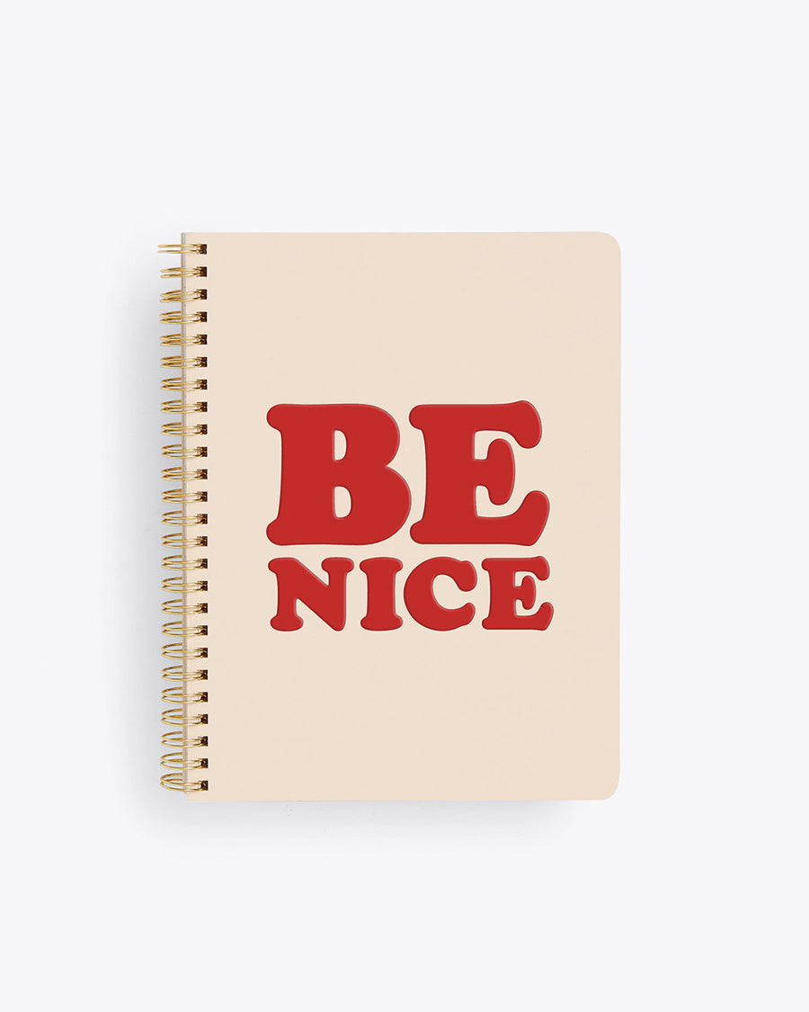 spiral bound notebook cover in ivory with BE NICE text graphic in deep red