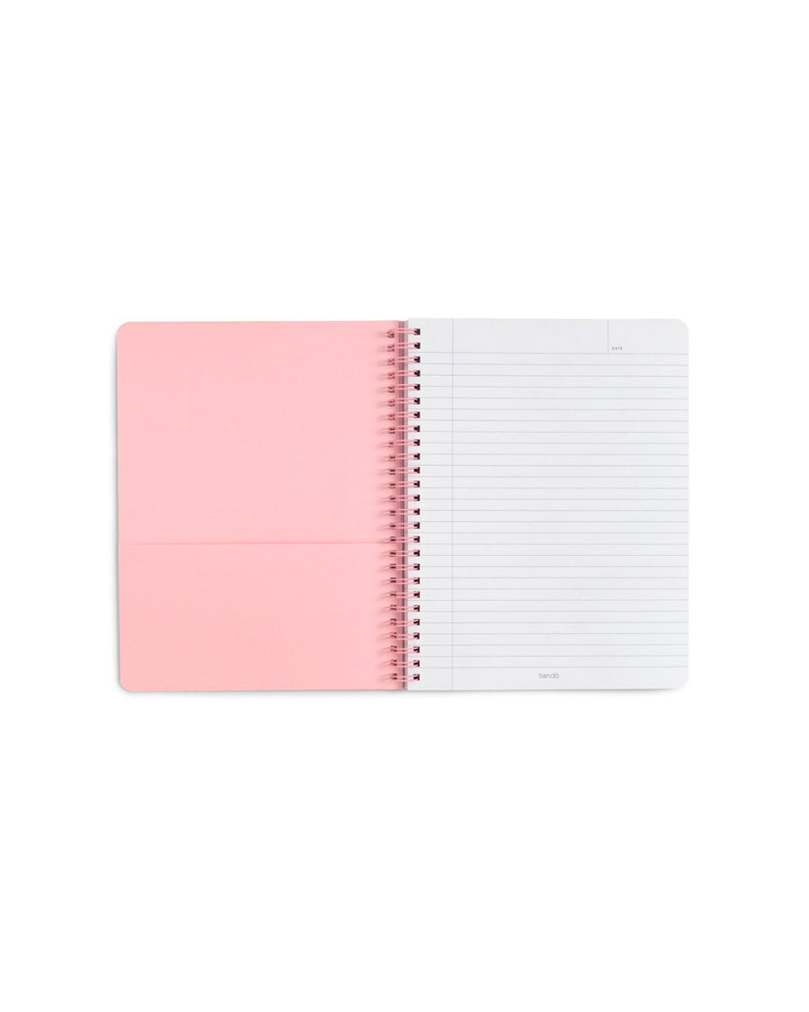 interior image of mini notebook featuring lined pages and a pocket 