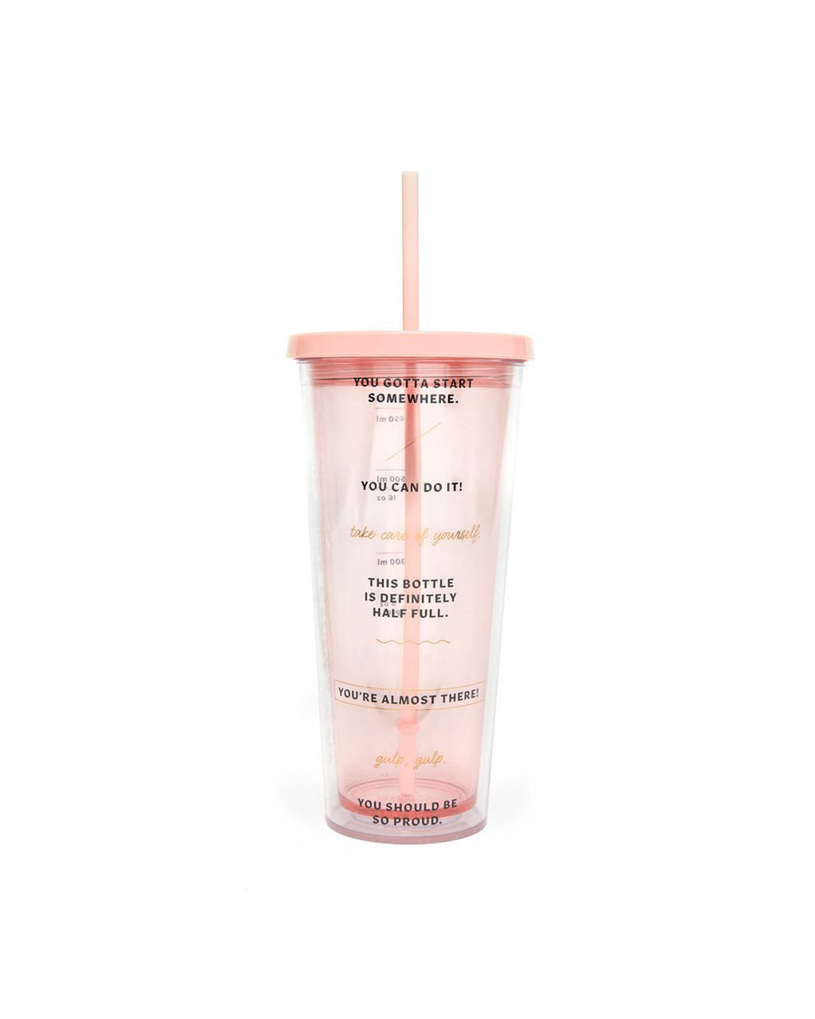 This tumbler is translucent pink with quotes printed on the side. 